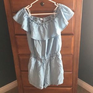 Off the shoulder romper with opening in back.